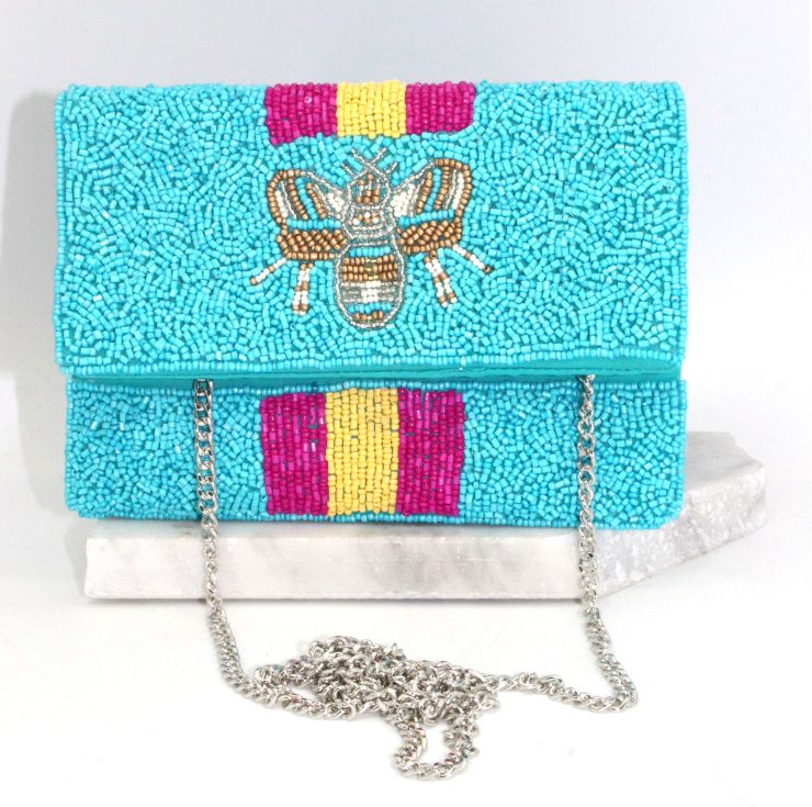 A photo of the Bee Beautiful Mini Clutch in Blue product