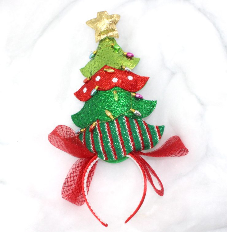 A photo of the Christmas Tree Head Band product