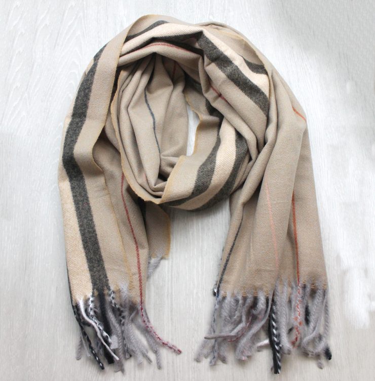 A photo of the Crisp Air Scarf in Brown product