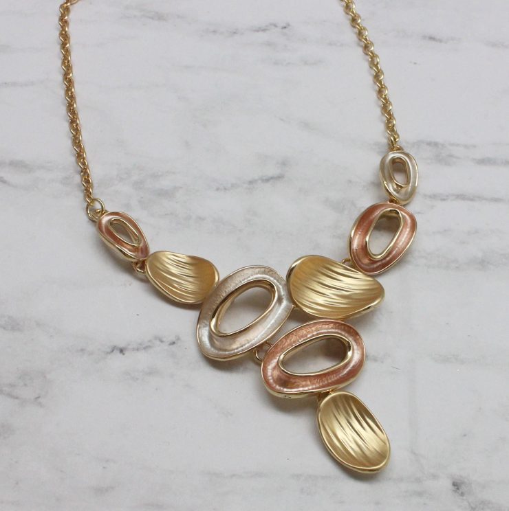 A photo of the Evelyn Necklace In Gold product