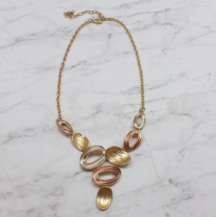 A photo of the Evelyn Necklace In Gold product