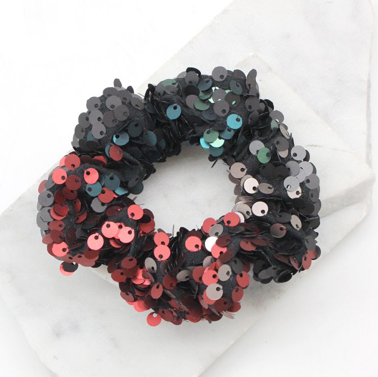 A photo of the Multi Color Sequin Scrunchie product