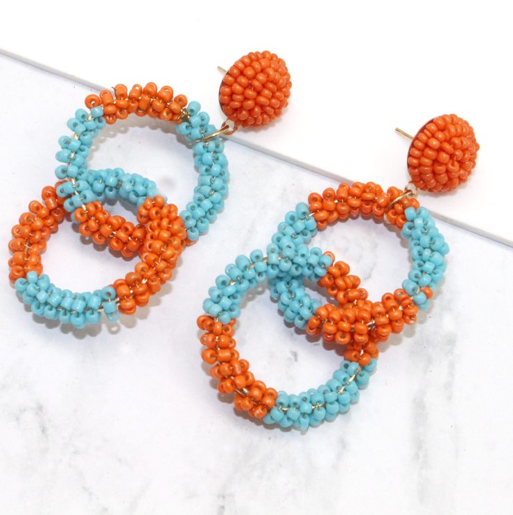 A photo of the Ring the Alarm in Turquoise and Orange product