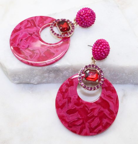 A photo of the Saskia Earrings In Fuchsia product