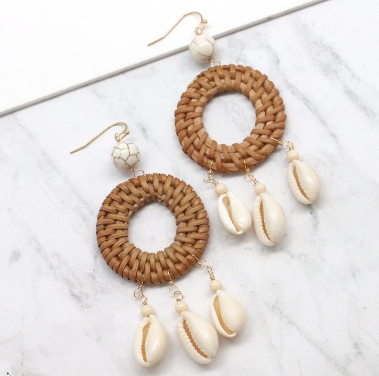 A photo of the Shell Catcher Earrings product