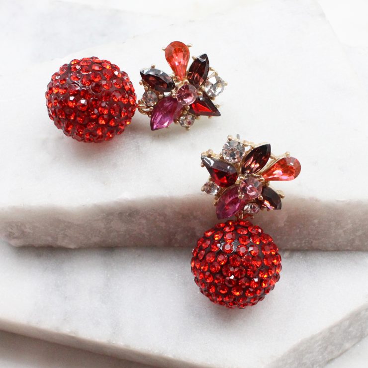 A photo of the Shining Bright Earrings In Red product
