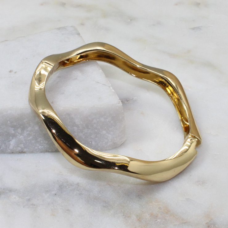 A photo of the Wavy Bracelet In Gold product