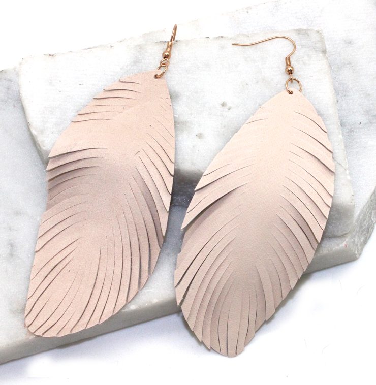 A photo of the Large Feather Earrings product