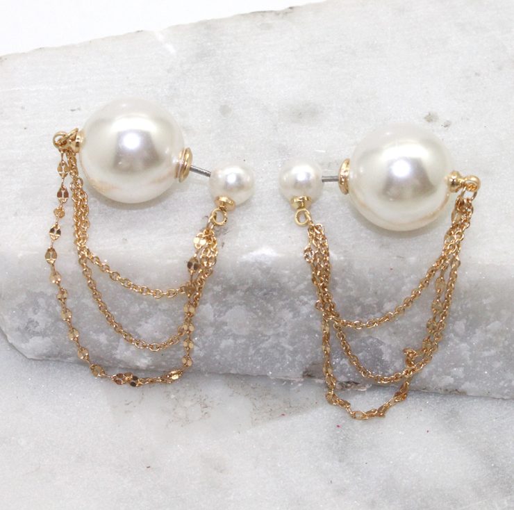 A photo of the Pearls and Chains Peek A Boo Earrings product