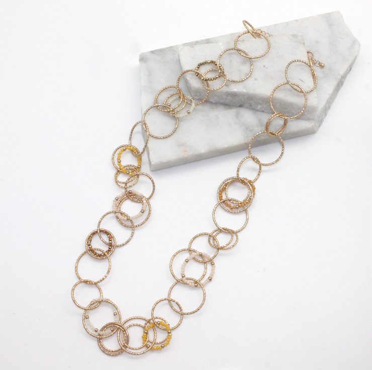 A photo of the Beaded Links Necklace in Yellow product