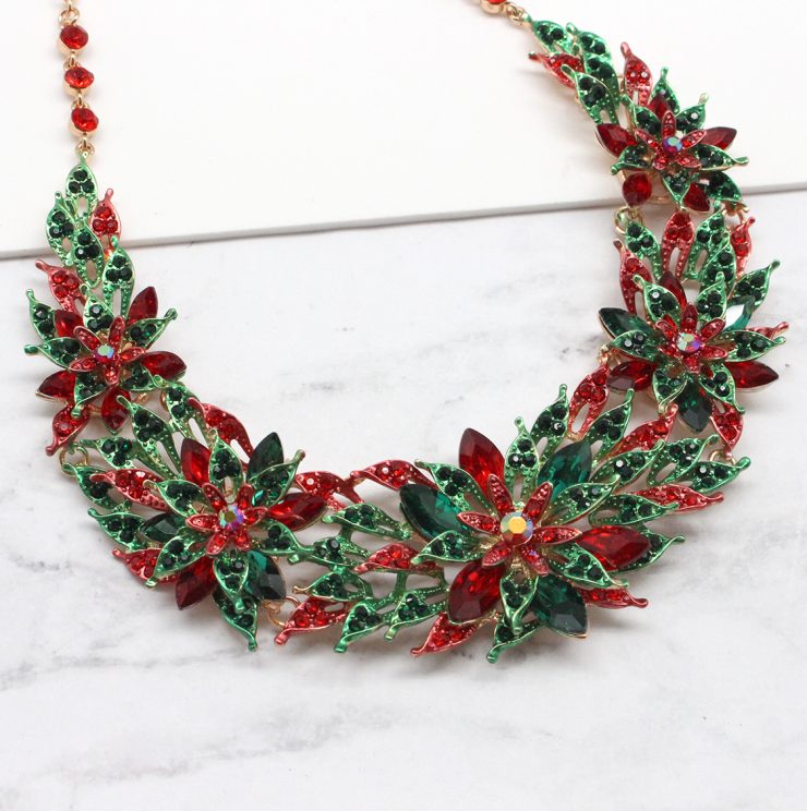 A photo of the Poinsettia Bib Necklace product