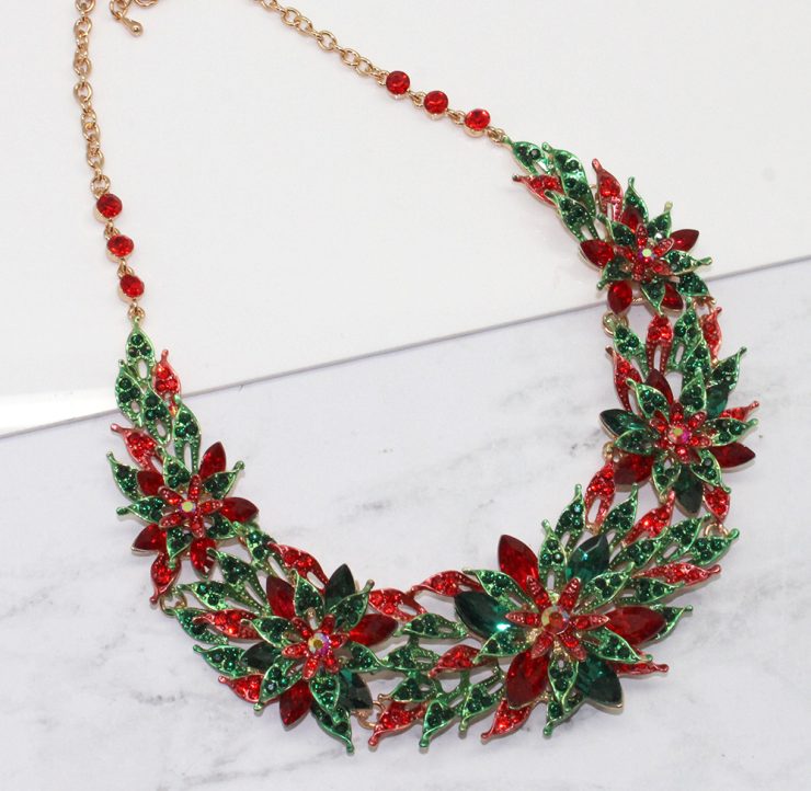 A photo of the Poinsettia Bib Necklace product