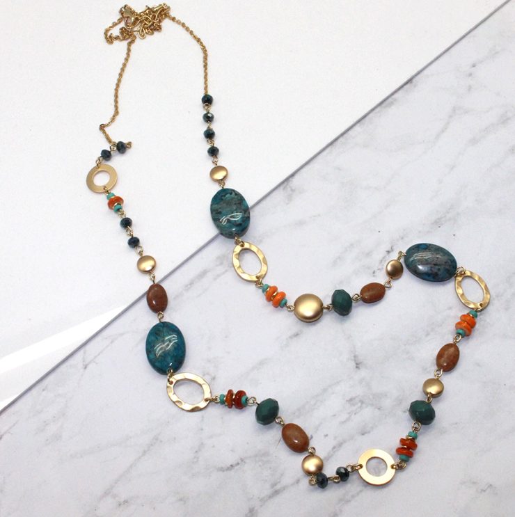 A photo of the Blue and Coral Pieces Necklace product