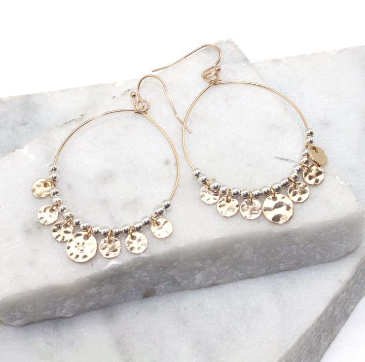 A photo of the Jingle Hoop Earrings in Two Tone product