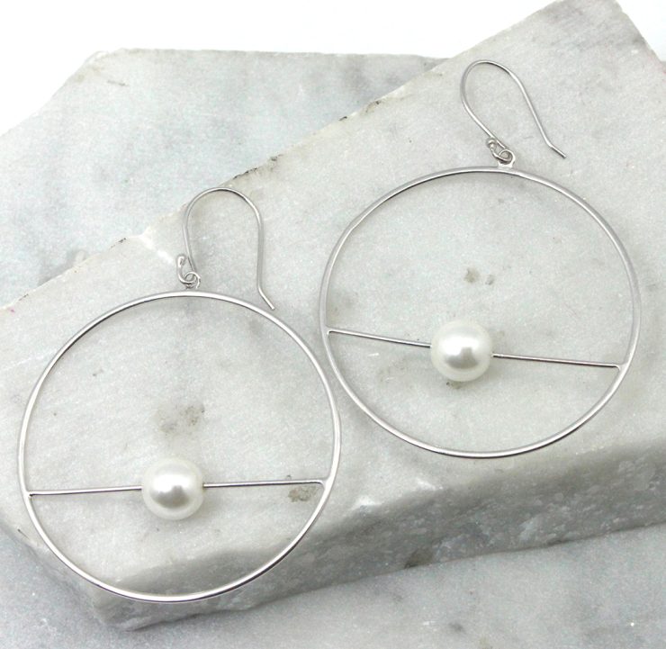 A photo of the Orbit Earrings product