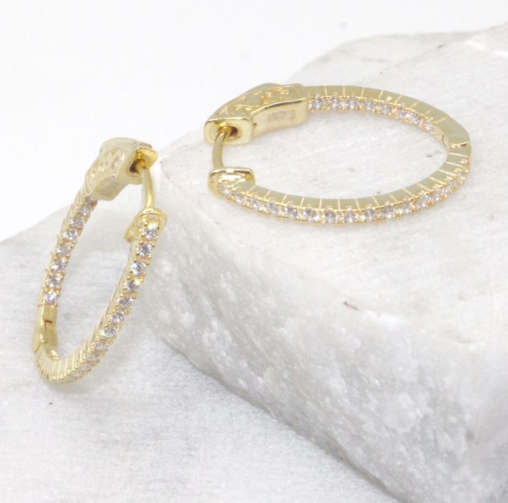 A photo of the Rhinestone Oval Hoop Earrings product