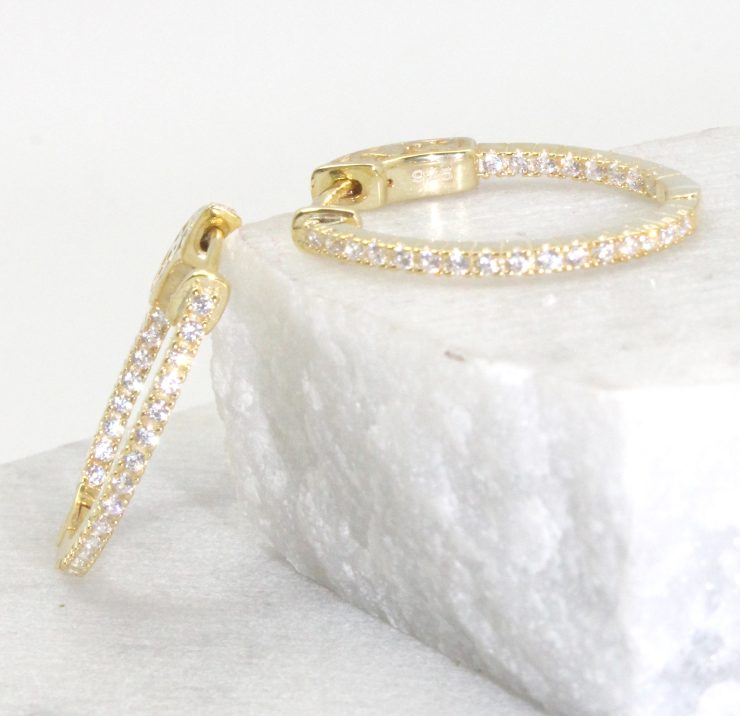 A photo of the Rhinestone Oval Hoop Earrings product