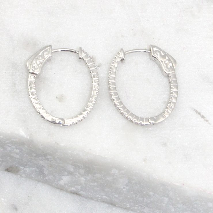 A photo of the Rhinestone Oval Hoop Earrings product