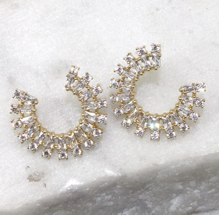 A photo of the Rhinestone Rim Earrings product