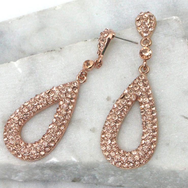 A photo of the Rose Gold Rhinestone Teardrop Earrings product