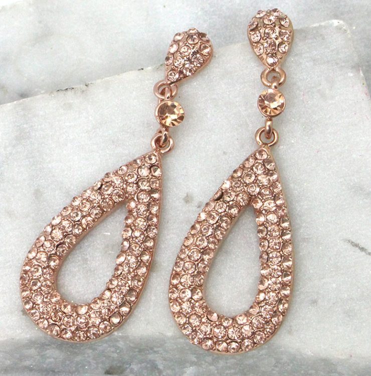 A photo of the Rose Gold Rhinestone Teardrop Earrings product