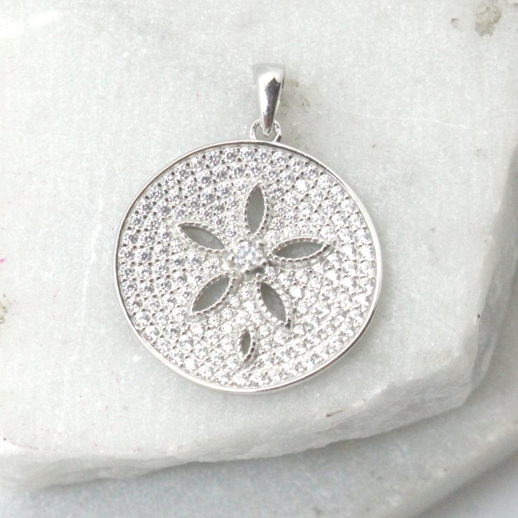 A photo of the Simple Sand Dollar Pendant product