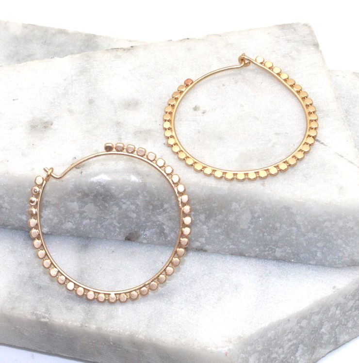 A photo of the Spotted Hoop Earrings product