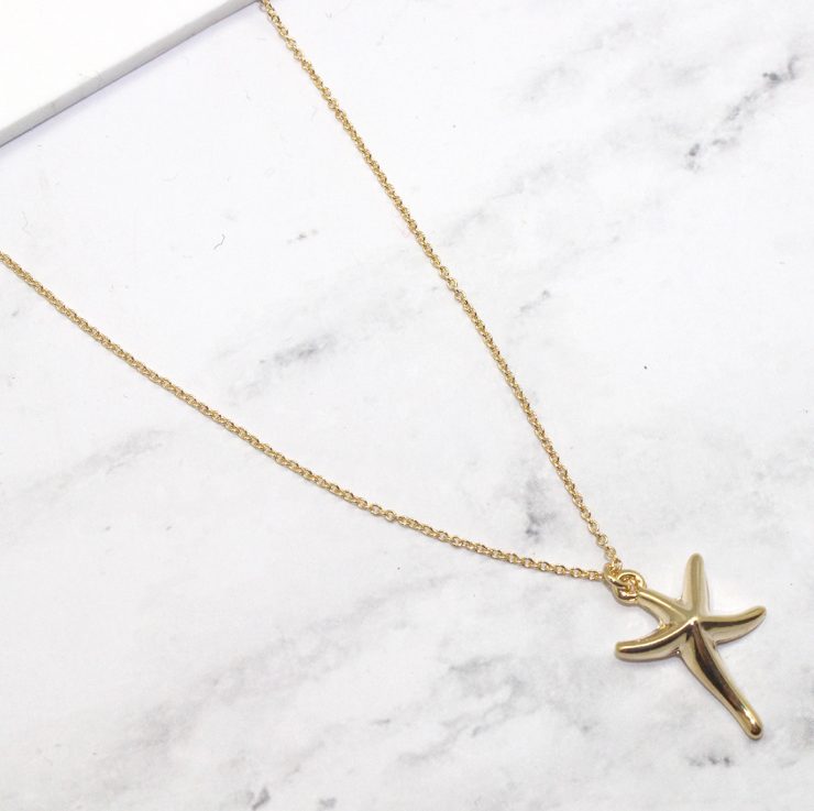 A photo of the Sunny Starfish Chain Necklace product