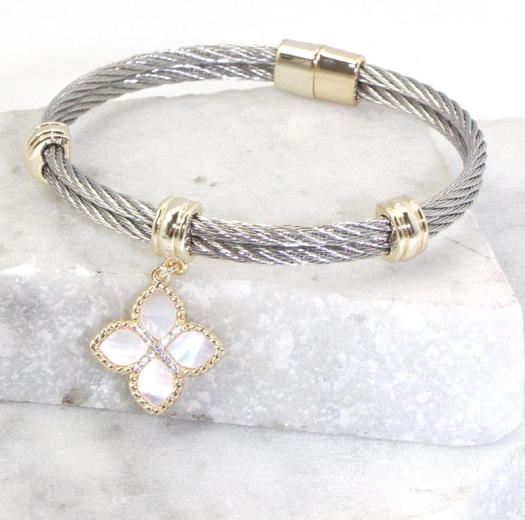 A photo of the Clover Bangle Bracelet product