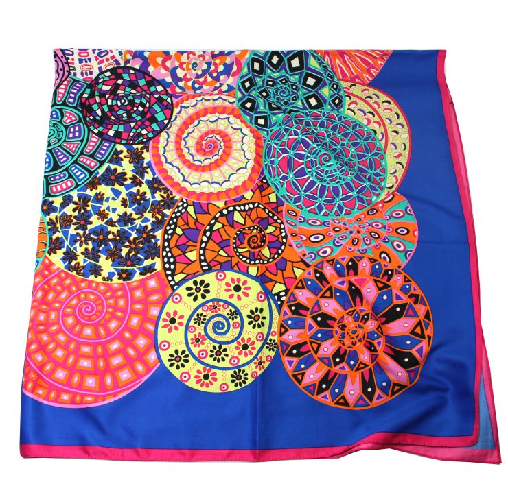 A photo of the Colorful Pinwheels Scarf product