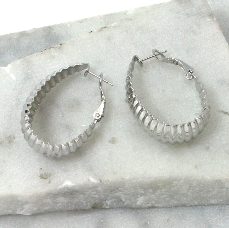 A photo of the Crinkled Hoop Earrings product