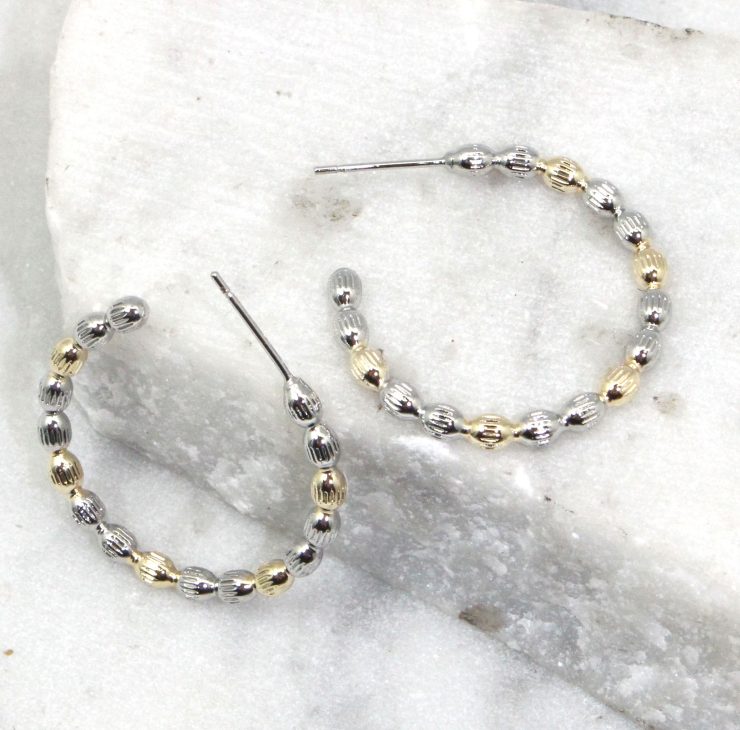 A photo of the Fired Up Hoop Earrings product