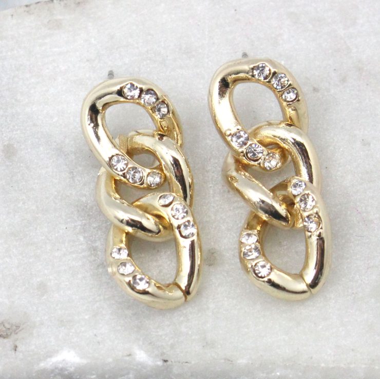 A photo of the Gold Links Earrings product
