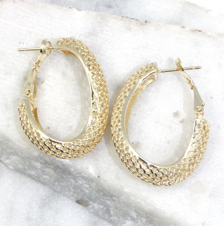 A photo of the Mesh Wave Hoop Earrings product