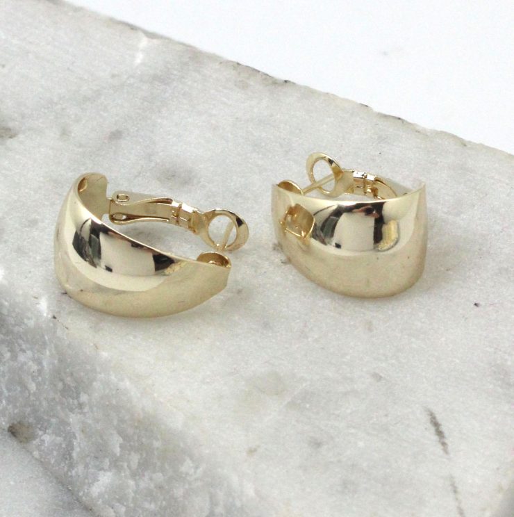 A photo of the Mirrored Hoop Earrings product