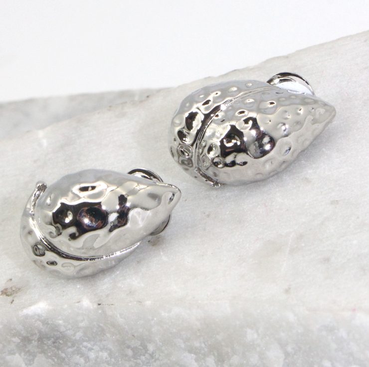 A photo of the Pear Clip On Earrings product