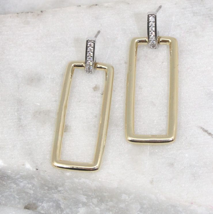 A photo of the Rectangle Link Earrings product