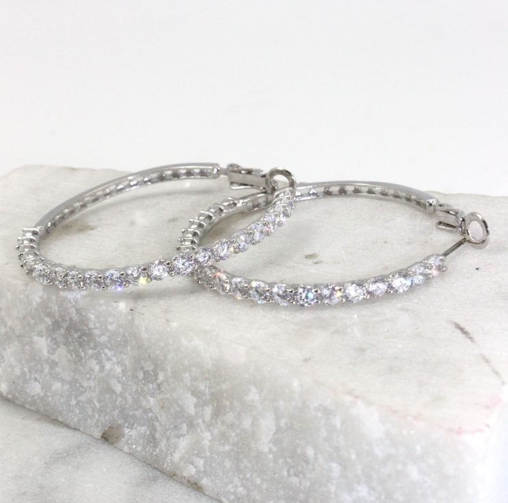 A photo of the Rhinestone Hoop Earrings product