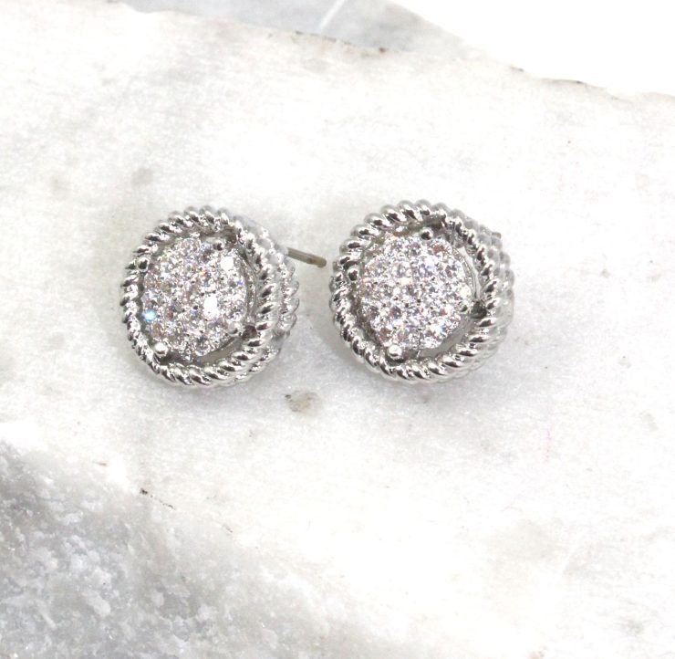 A photo of the Rhinestone Wheel Earrings product