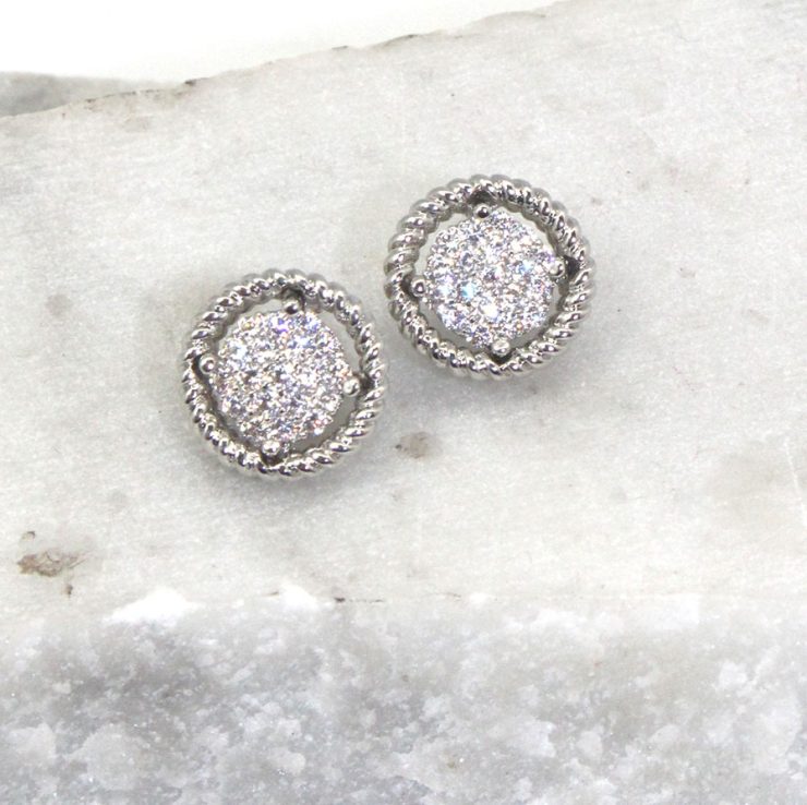 A photo of the Rhinestone Wheel Earrings product