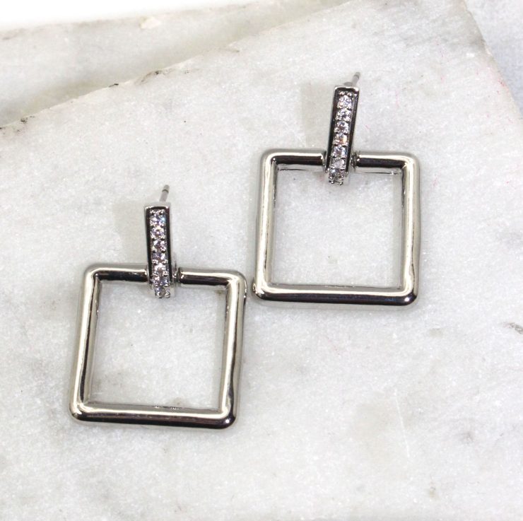A photo of the Square Link Earrings product