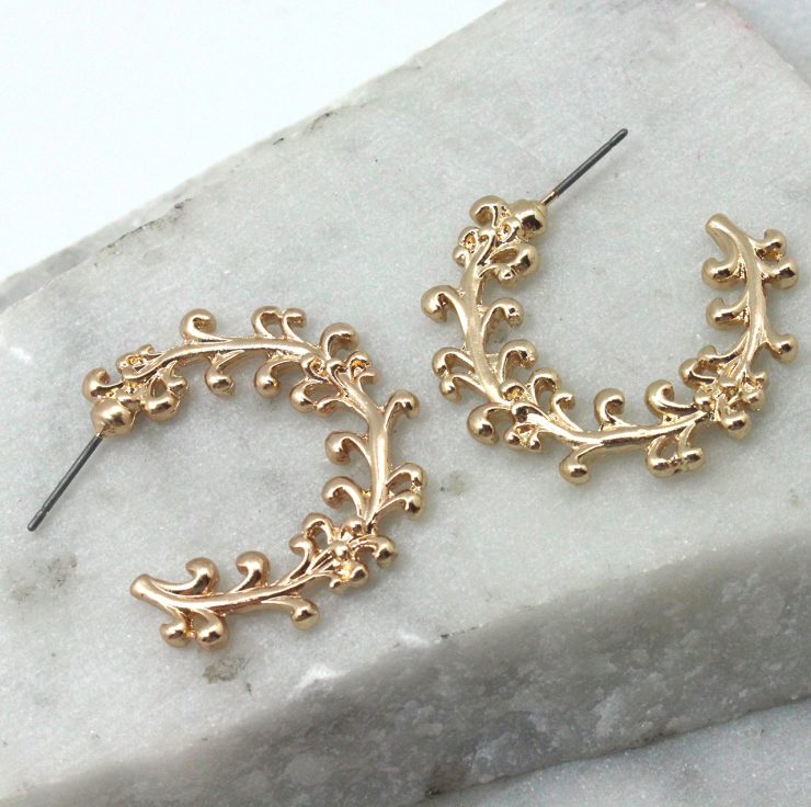 A photo of the Vine Hoop Earrings product
