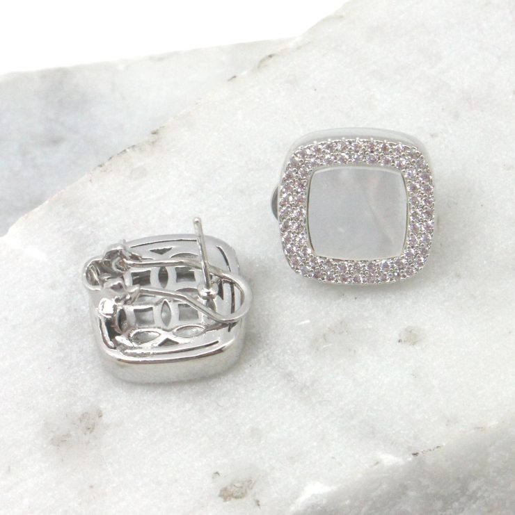 A photo of the White Rhinestone Square Earrings product