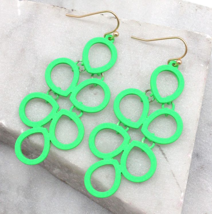 A photo of the Neon Comb Earrings product