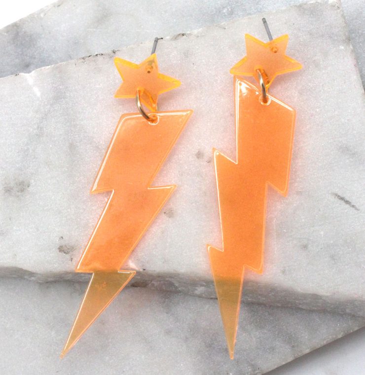 A photo of the Lighting Lucite Neon Earrings product