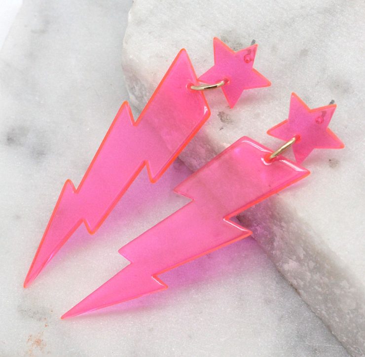 A photo of the Lighting Lucite Neon Earrings product