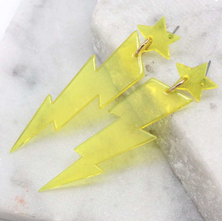 A photo of the Lighting Lucite Neon Earrings product