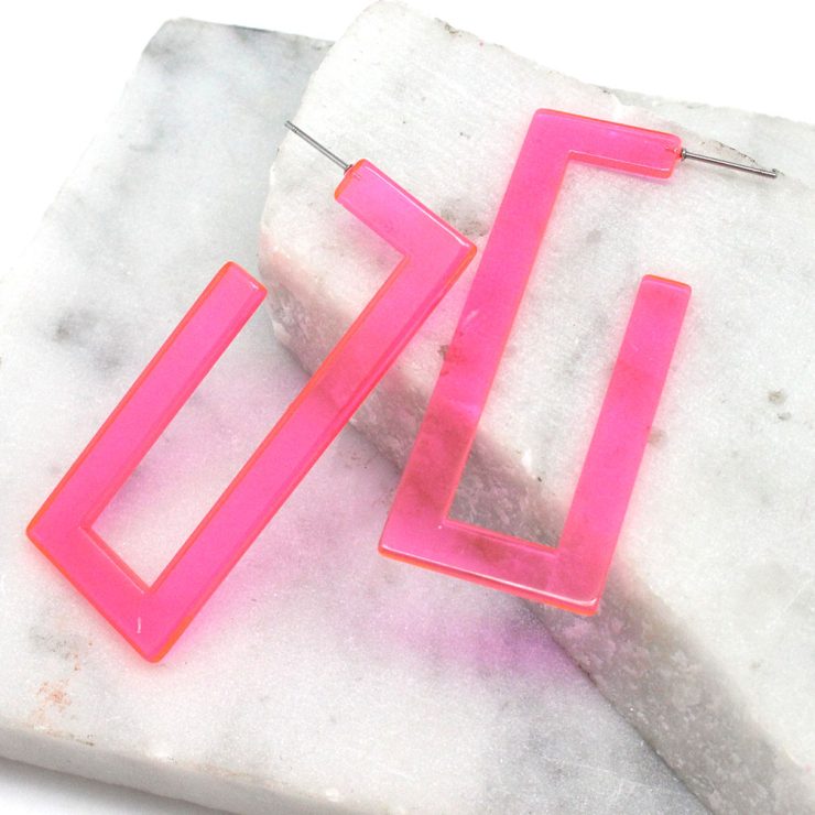 A photo of the Neon Lucite Rectangle Earrings product