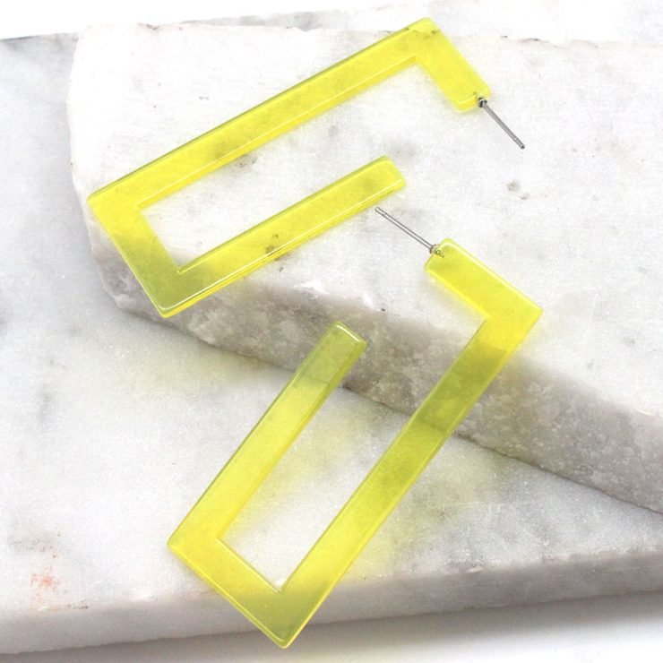 A photo of the Neon Lucite Rectangle Earrings product