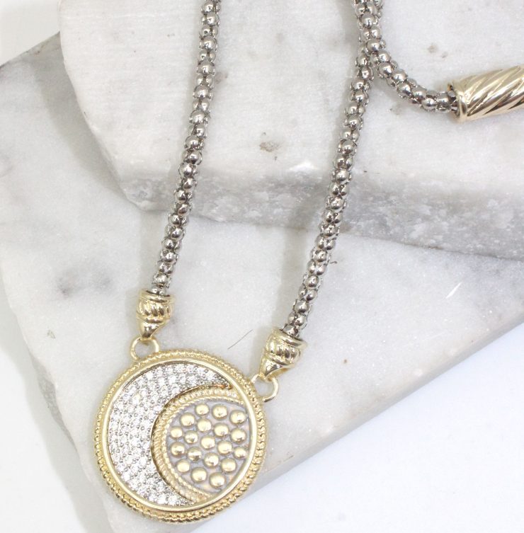 A photo of the To the Moon Necklace product